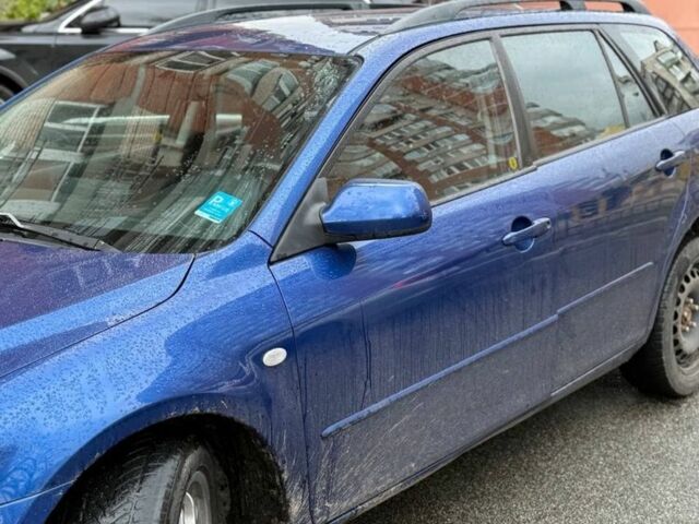 Синий Мазда 6, объемом двигателя 2 л и пробегом 221 тыс. км за 1800 $, фото 2 на Automoto.ua