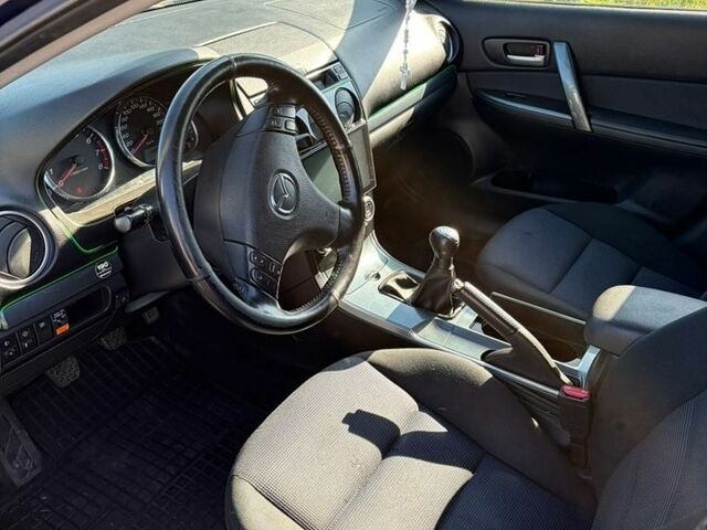 Синій Мазда 6, об'ємом двигуна 1.8 л та пробігом 235 тис. км за 3199 $, фото 4 на Automoto.ua