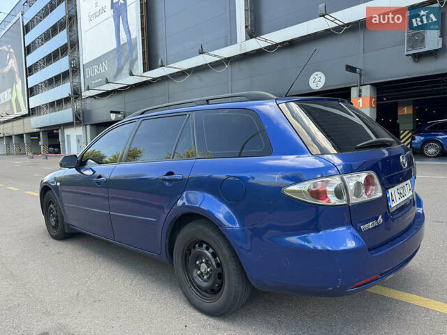 Синій Мазда 6, об'ємом двигуна 1.8 л та пробігом 294 тис. км за 3450 $, фото 5 на Automoto.ua