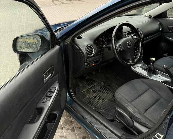 Синий Мазда 6, объемом двигателя 2 л и пробегом 367 тыс. км за 2350 $, фото 4 на Automoto.ua