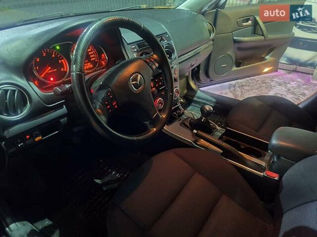 Синий Мазда 6, объемом двигателя 2 л и пробегом 278 тыс. км за 3800 $, фото 5 на Automoto.ua