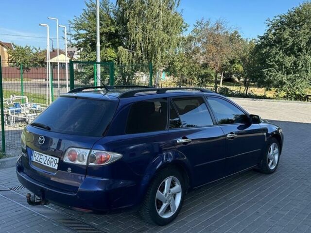 Синий Мазда 6, объемом двигателя 2 л и пробегом 320 тыс. км за 1899 $, фото 4 на Automoto.ua