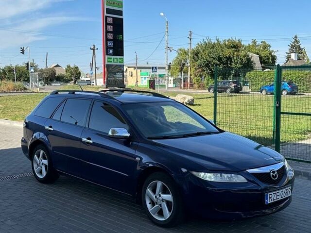 Синий Мазда 6, объемом двигателя 2 л и пробегом 320 тыс. км за 1899 $, фото 3 на Automoto.ua