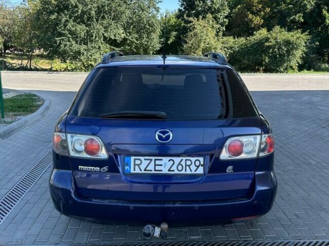 Синий Мазда 6, объемом двигателя 2 л и пробегом 320 тыс. км за 1899 $, фото 6 на Automoto.ua