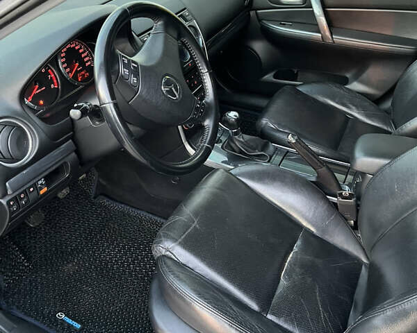 Синий Мазда 6, объемом двигателя 2 л и пробегом 212 тыс. км за 5500 $, фото 6 на Automoto.ua