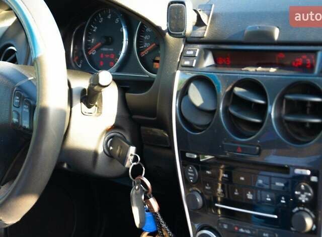 Синій Мазда 6, об'ємом двигуна 1.8 л та пробігом 263 тис. км за 4450 $, фото 9 на Automoto.ua