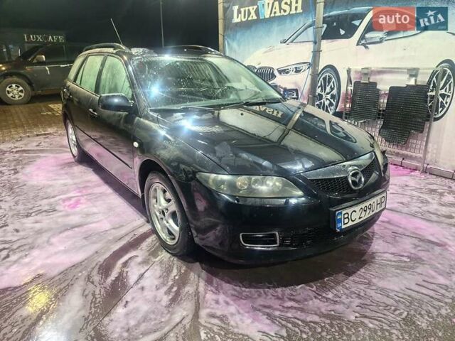 Синий Мазда 6, объемом двигателя 2 л и пробегом 278 тыс. км за 3800 $, фото 2 на Automoto.ua