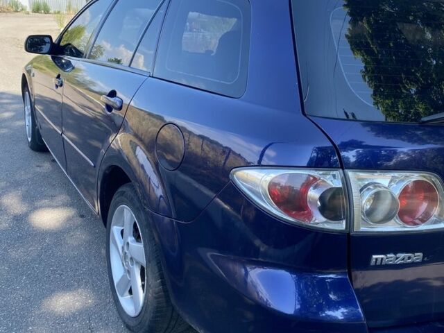Синий Мазда 6, объемом двигателя 2 л и пробегом 260 тыс. км за 4300 $, фото 5 на Automoto.ua