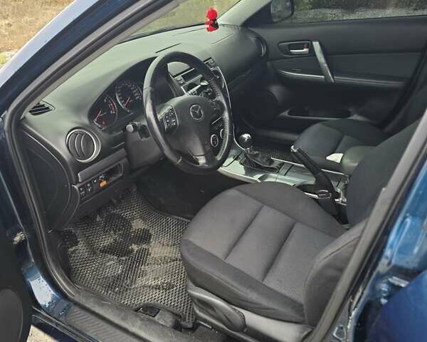 Синий Мазда 6, объемом двигателя 2 л и пробегом 250 тыс. км за 4250 $, фото 2 на Automoto.ua