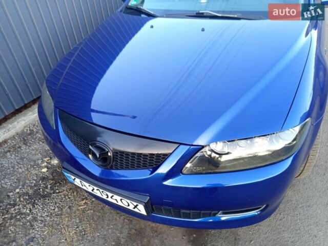 Синий Мазда 6, объемом двигателя 2 л и пробегом 413 тыс. км за 4900 $, фото 7 на Automoto.ua
