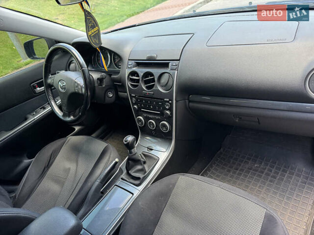 Синій Мазда 6, об'ємом двигуна 1.8 л та пробігом 294 тис. км за 3450 $, фото 15 на Automoto.ua