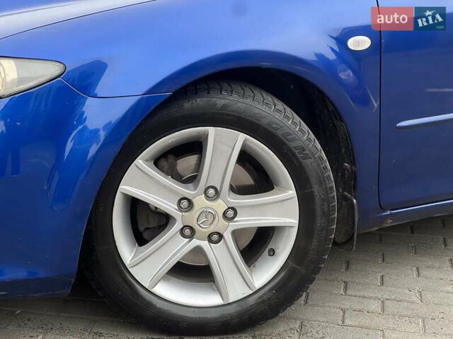 Синій Мазда 6, об'ємом двигуна 2 л та пробігом 337 тис. км за 2999 $, фото 5 на Automoto.ua