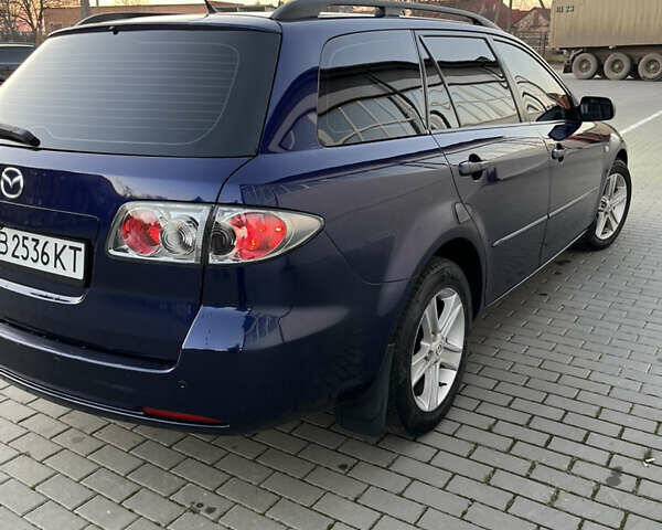 Синий Мазда 6, объемом двигателя 2 л и пробегом 212 тыс. км за 5500 $, фото 2 на Automoto.ua