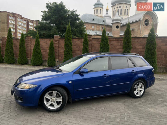 Синій Мазда 6, об'ємом двигуна 2 л та пробігом 337 тис. км за 2999 $, фото 4 на Automoto.ua