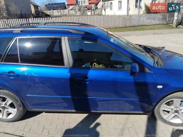 Синій Мазда 6, об'ємом двигуна 2 л та пробігом 346 тис. км за 3650 $, фото 14 на Automoto.ua
