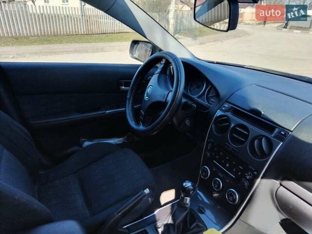 Синій Мазда 6, об'ємом двигуна 2 л та пробігом 346 тис. км за 3650 $, фото 10 на Automoto.ua
