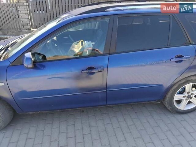 Синій Мазда 6, об'ємом двигуна 2 л та пробігом 346 тис. км за 3650 $, фото 15 на Automoto.ua