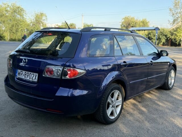Синий Мазда 6, объемом двигателя 2 л и пробегом 300 тыс. км за 2842 $, фото 2 на Automoto.ua