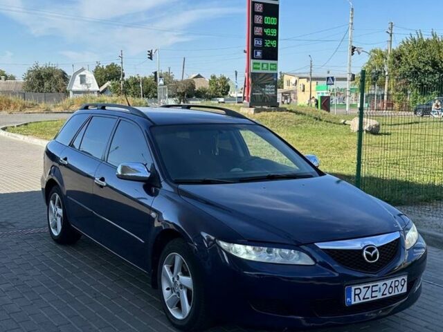 Синий Мазда 6, объемом двигателя 2 л и пробегом 320 тыс. км за 1899 $, фото 2 на Automoto.ua