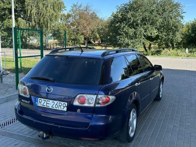 Синий Мазда 6, объемом двигателя 2 л и пробегом 320 тыс. км за 1899 $, фото 5 на Automoto.ua
