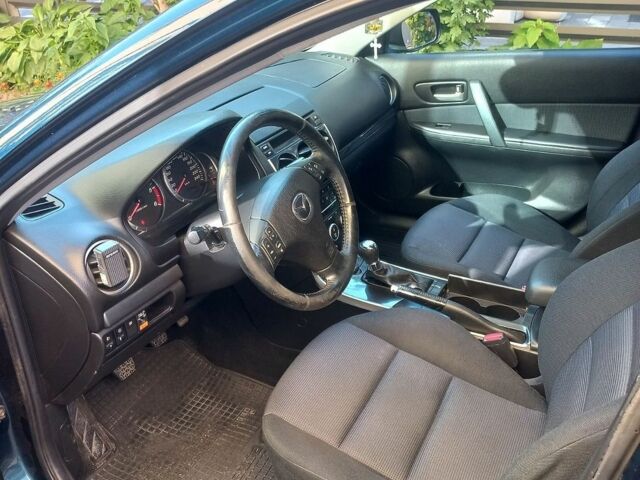 Синий Мазда 6, объемом двигателя 2 л и пробегом 249 тыс. км за 3200 $, фото 9 на Automoto.ua