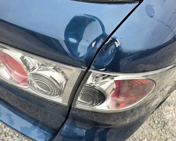 Синий Мазда 6, объемом двигателя 2 л и пробегом 250 тыс. км за 4250 $, фото 16 на Automoto.ua