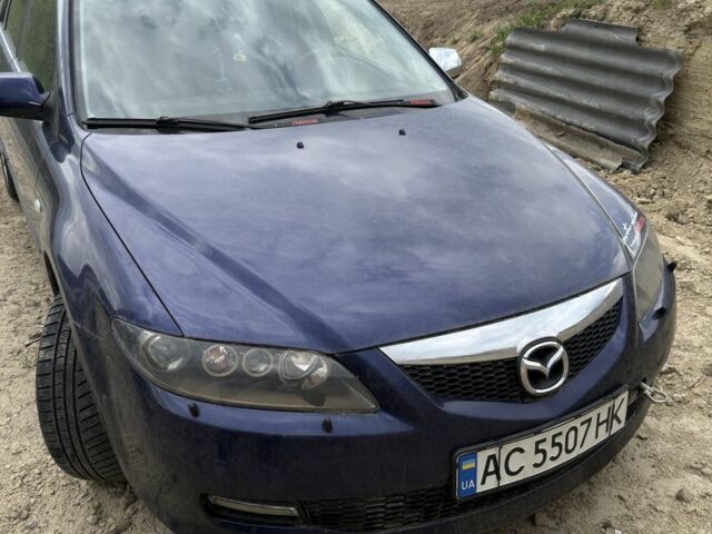 Синій Мазда 6, об'ємом двигуна 2 л та пробігом 310 тис. км за 2800 $, фото 1 на Automoto.ua