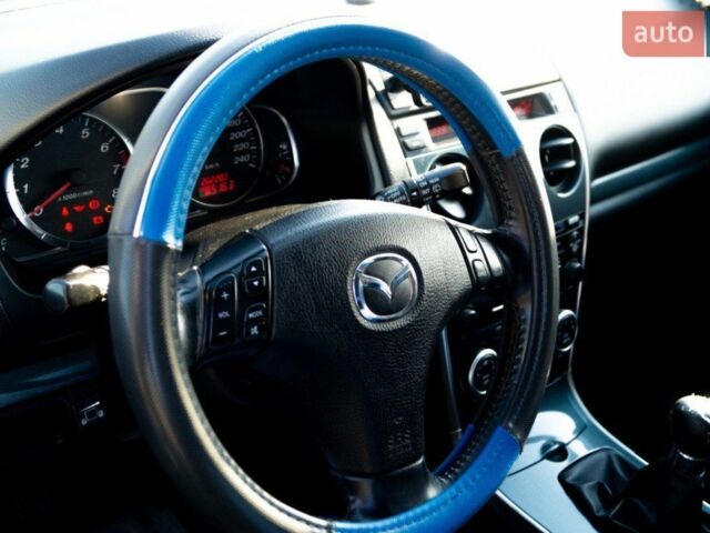Синій Мазда 6, об'ємом двигуна 1.8 л та пробігом 265 тис. км за 4450 $, фото 5 на Automoto.ua