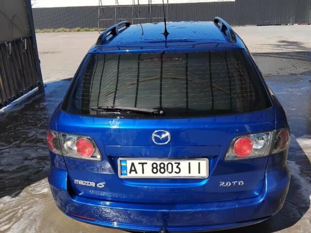 Синий Мазда 6, объемом двигателя 2 л и пробегом 346 тыс. км за 3800 $, фото 2 на Automoto.ua