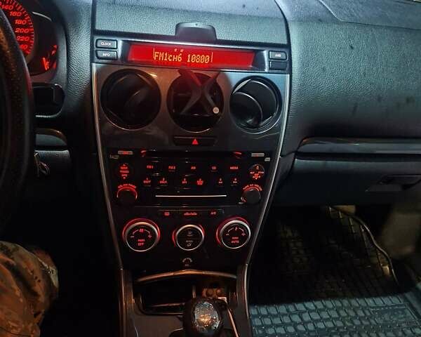 Синий Мазда 6, объемом двигателя 2 л и пробегом 278 тыс. км за 3800 $, фото 6 на Automoto.ua