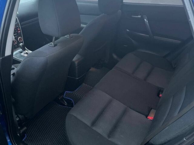 Синій Мазда 6, об'ємом двигуна 2 л та пробігом 243 тис. км за 5600 $, фото 5 на Automoto.ua