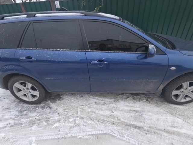 Синій Мазда 6, об'ємом двигуна 2 л та пробігом 243 тис. км за 5600 $, фото 4 на Automoto.ua