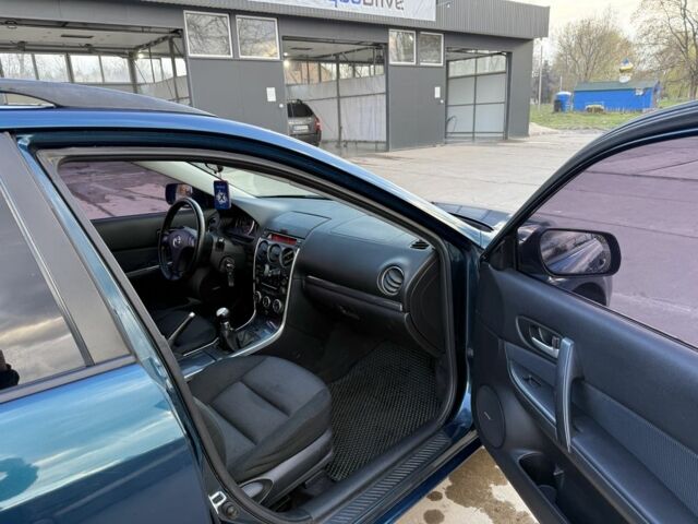 Синій Мазда 6, об'ємом двигуна 1.8 л та пробігом 303 тис. км за 4800 $, фото 12 на Automoto.ua