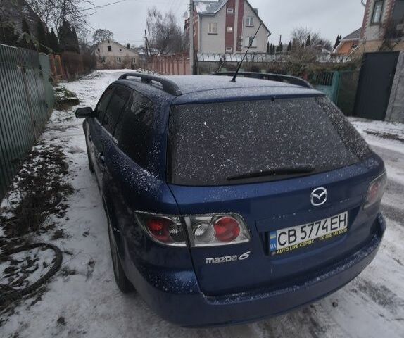 Синій Мазда 6, об'ємом двигуна 2 л та пробігом 243 тис. км за 5600 $, фото 3 на Automoto.ua