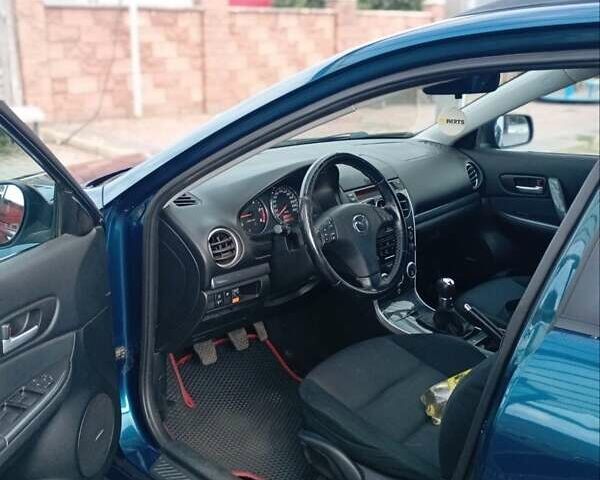 Синій Мазда 6, об'ємом двигуна 2 л та пробігом 239 тис. км за 6100 $, фото 6 на Automoto.ua