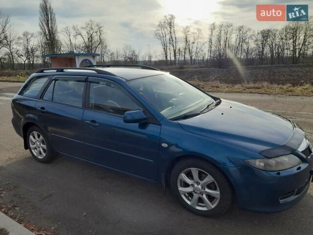 Синий Мазда 6, объемом двигателя 2 л и пробегом 262 тыс. км за 4700 $, фото 1 на Automoto.ua