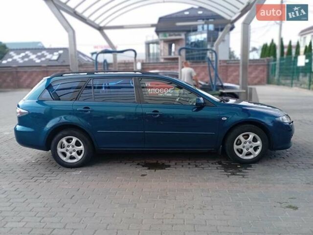 Синій Мазда 6, об'ємом двигуна 2 л та пробігом 239 тис. км за 6100 $, фото 4 на Automoto.ua