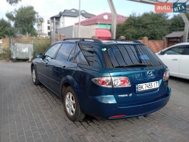 Синій Мазда 6, об'ємом двигуна 2 л та пробігом 239 тис. км за 6100 $, фото 2 на Automoto.ua