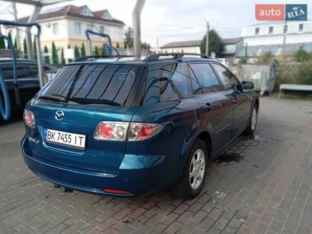 Синій Мазда 6, об'ємом двигуна 2 л та пробігом 239 тис. км за 6100 $, фото 1 на Automoto.ua