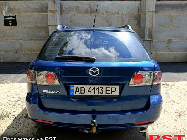 Синий Мазда 6, объемом двигателя 2 л и пробегом 203 тыс. км за 4000 $, фото 2 на Automoto.ua