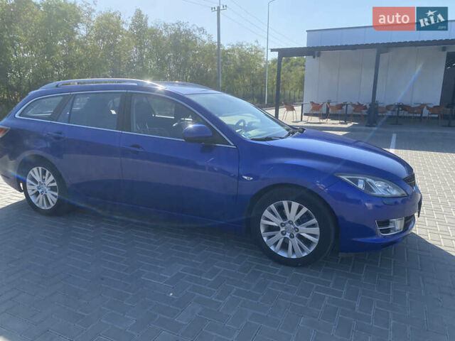 Синий Мазда 6, объемом двигателя 2 л и пробегом 213 тыс. км за 6100 $, фото 4 на Automoto.ua