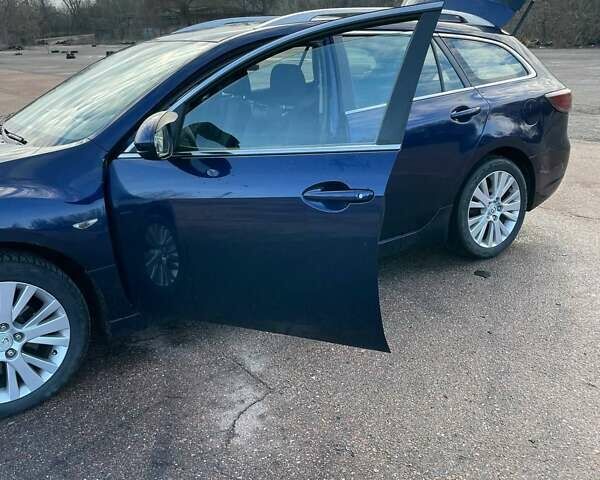 Синий Мазда 6, объемом двигателя 2 л и пробегом 220 тыс. км за 6000 $, фото 6 на Automoto.ua