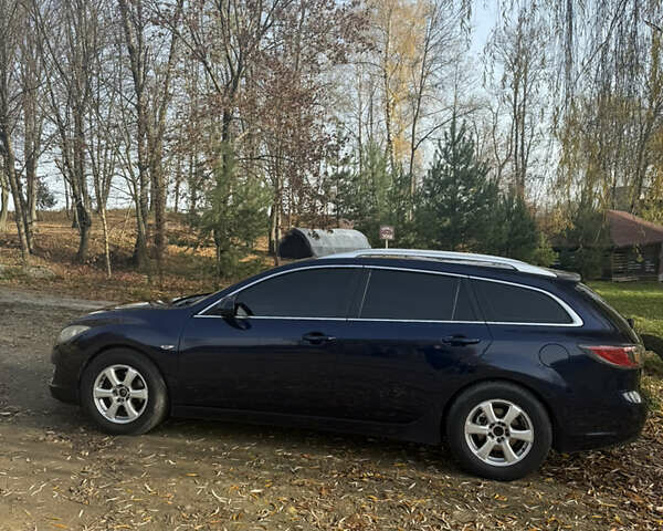 Синий Мазда 6, объемом двигателя 2 л и пробегом 303 тыс. км за 6800 $, фото 5 на Automoto.ua