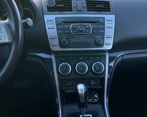 Синий Мазда 6, объемом двигателя 2 л и пробегом 220 тыс. км за 6000 $, фото 4 на Automoto.ua