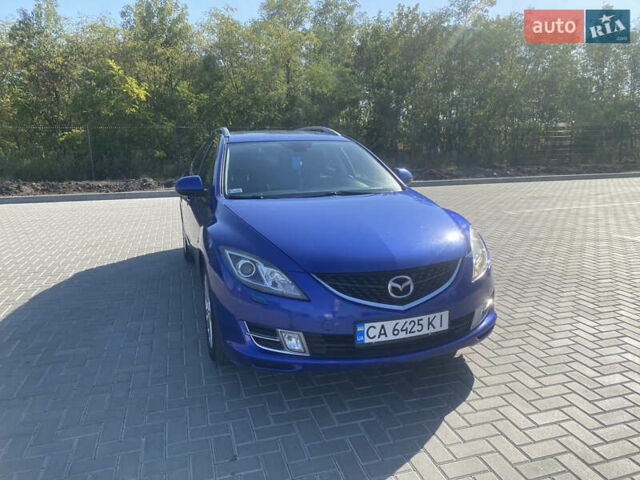Синий Мазда 6, объемом двигателя 2 л и пробегом 213 тыс. км за 6100 $, фото 1 на Automoto.ua