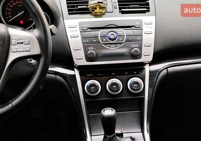 Синій Мазда 6, об'ємом двигуна 1.8 л та пробігом 211 тис. км за 6800 $, фото 19 на Automoto.ua