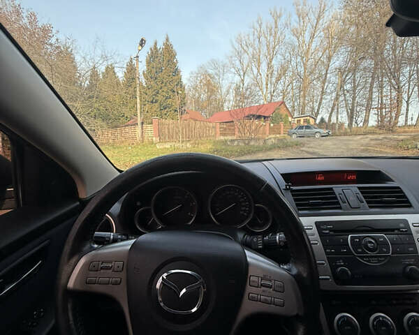 Синий Мазда 6, объемом двигателя 2 л и пробегом 303 тыс. км за 6800 $, фото 21 на Automoto.ua