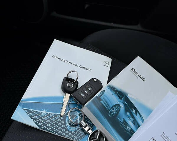 Синій Мазда 6, об'ємом двигуна 2 л та пробігом 220 тис. км за 6750 $, фото 29 на Automoto.ua