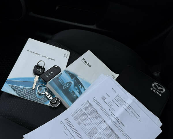 Синій Мазда 6, об'ємом двигуна 2 л та пробігом 220 тис. км за 6750 $, фото 28 на Automoto.ua