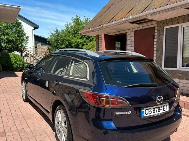 Синий Мазда 6, объемом двигателя 2 л и пробегом 227 тыс. км за 6550 $, фото 2 на Automoto.ua